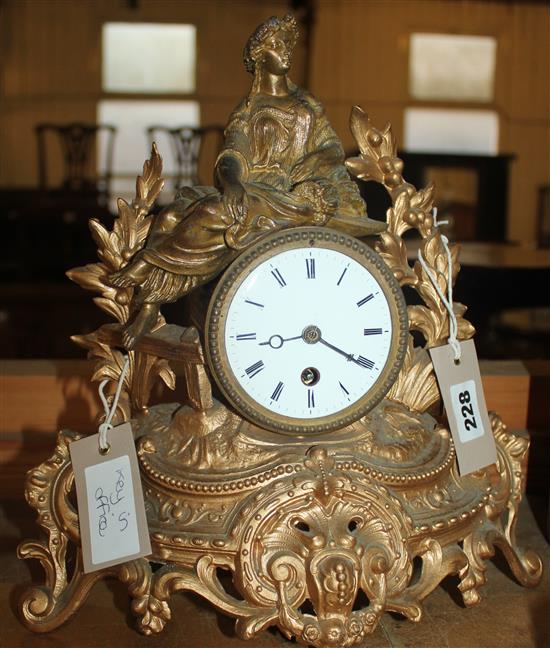 Figurative brass clock